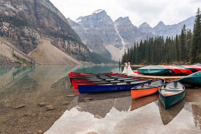 Moraine Lake Elopement photo. Canoes. Banff photographer. LGBTQ+ Lauren Hollamby Photography