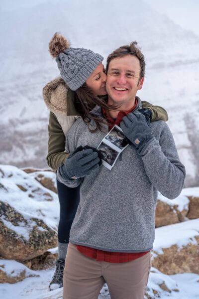 Peyto Lake pregnancy announcement photoshoot. Banff Photographer